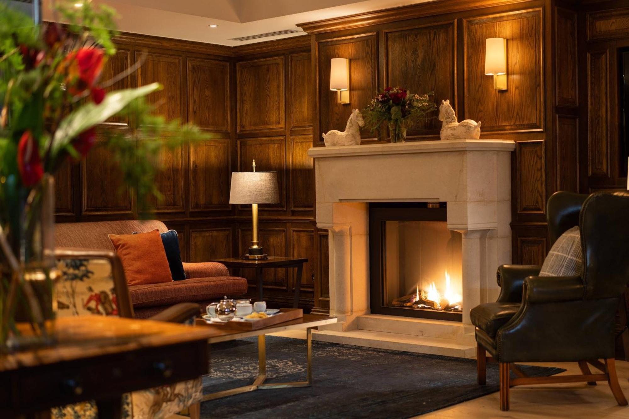 Mount Juliet Estate, Autograph Collection Hotell Thomastown  Eksteriør bilde The fireplace in the hotel's lobby